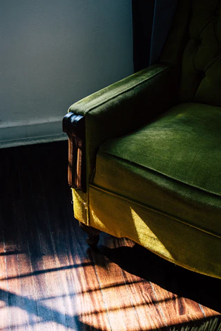 A freshly painted vintage chair in a cozy, sunlit room.
