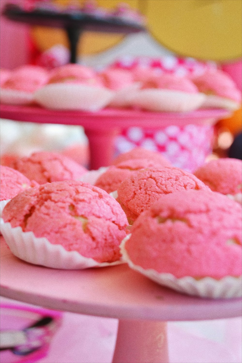 pink ice cream on white ceramic bowl