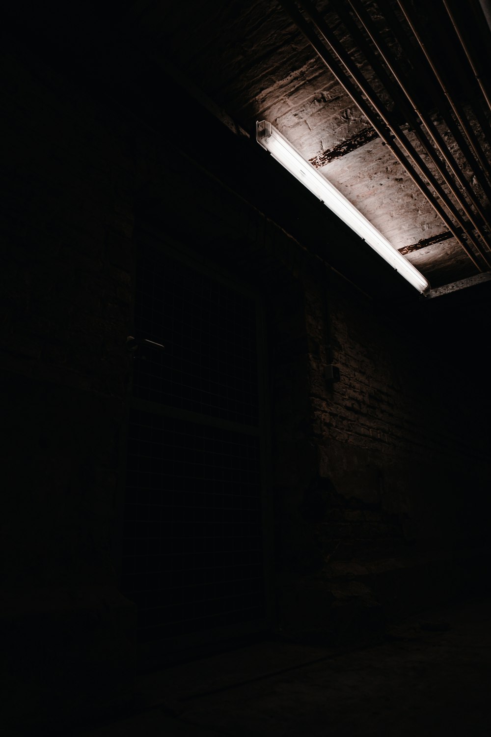 brown wooden wall with white wooden window