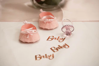 pink and white heart shaped cake