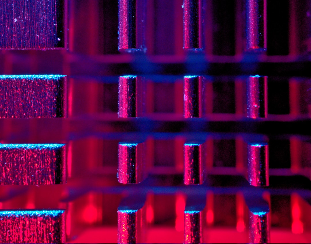 red and black metal frame, Abstract view of CPU Heat Sink. More Technology Images can be seen on Unsplash here: https://