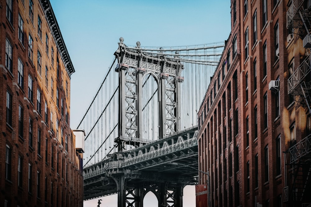 gray bridge under blue sky during daytime