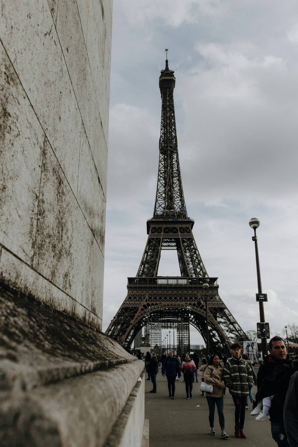 eiffel tower under white clouds during daytime