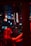 A vibrant bar scene with colorful drinks and neon lights illuminating the atmosphere.