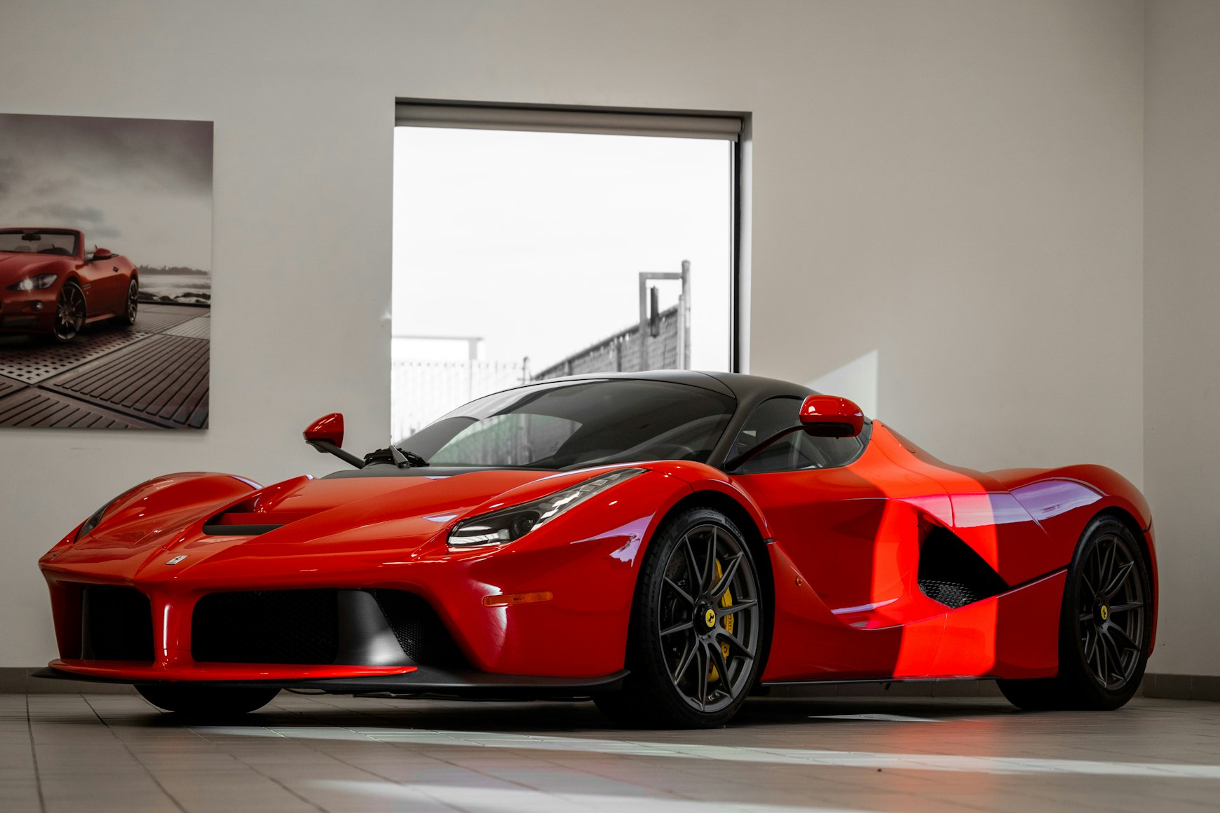 Sleek red sports car in motion