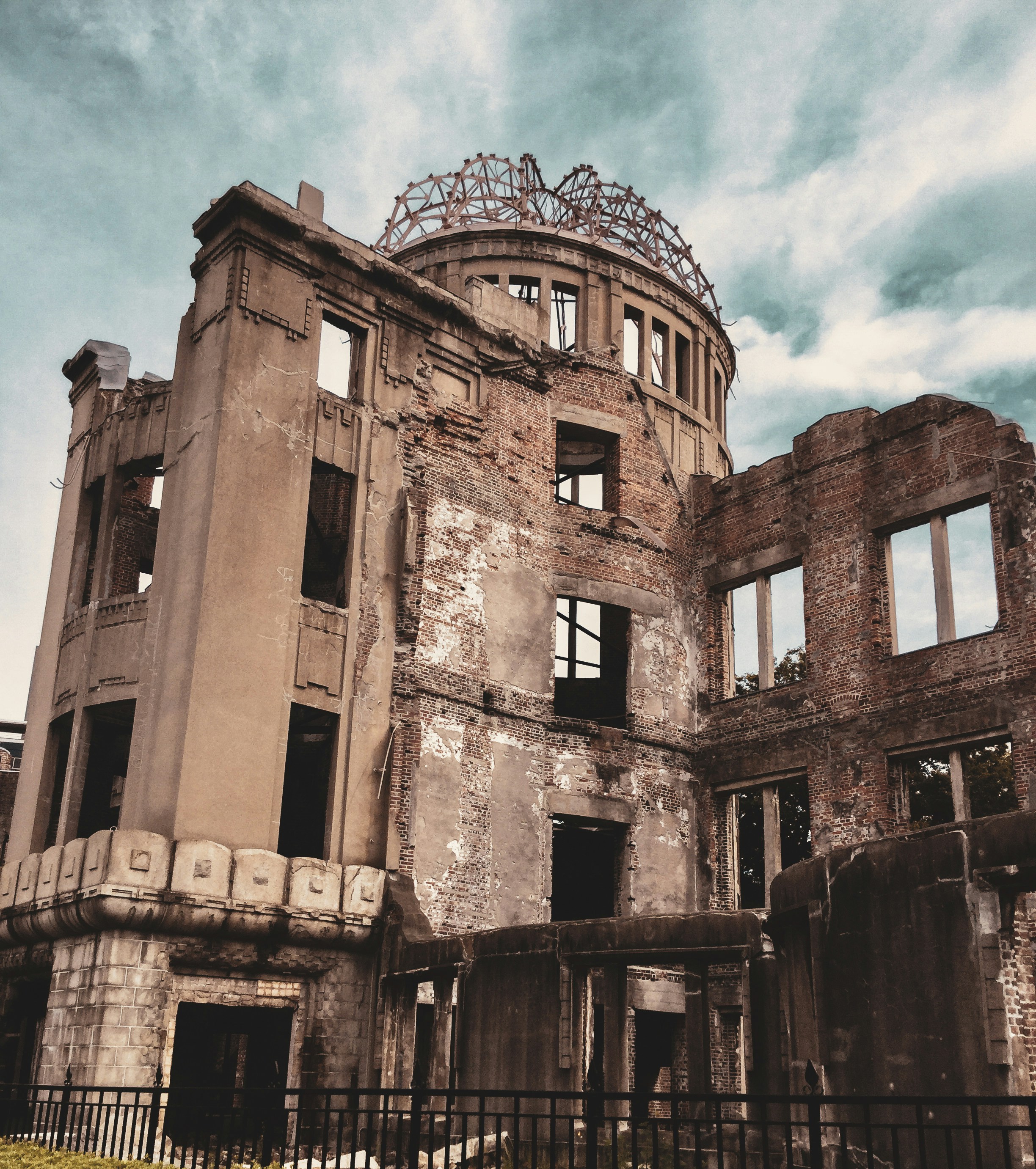 brown concrete building under blue sky during daytime