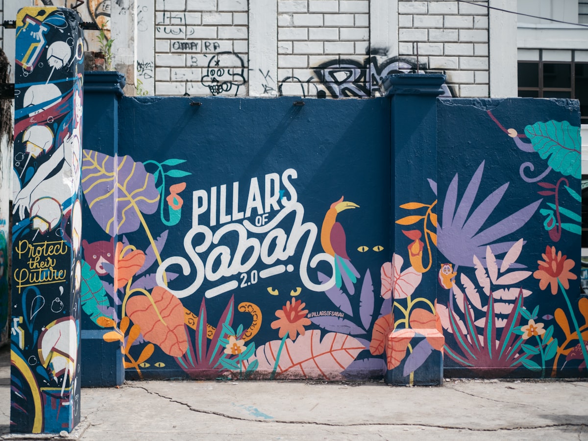 Kota Kinabalu City Centre — colourful Pillars of Sabah mural in the urban waterfront district