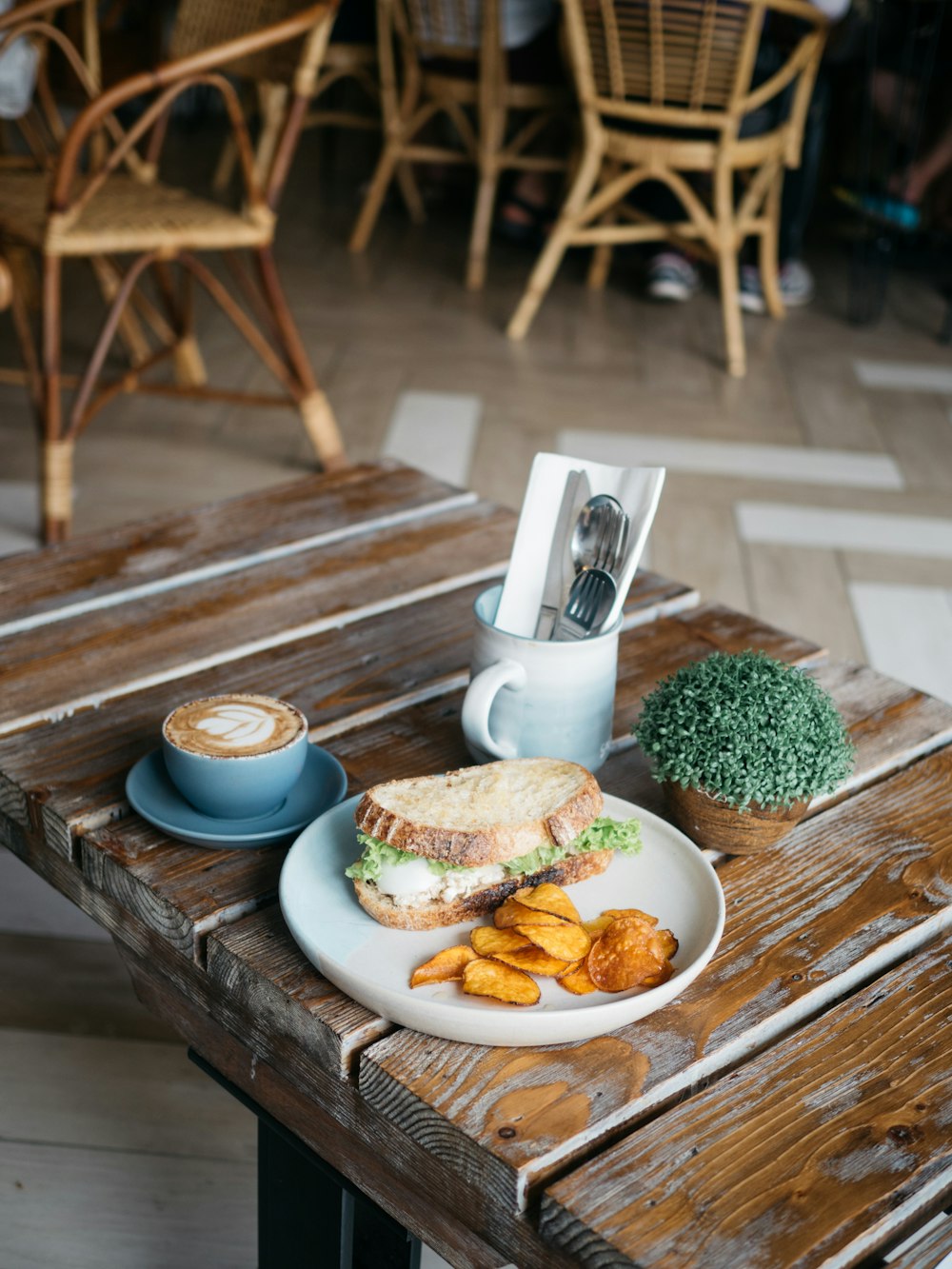 bread with green vegetable on white ceramic plate