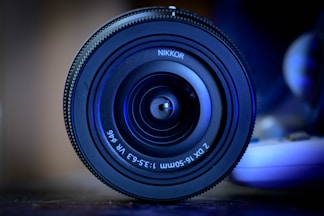 A close-up of a camera lens capturing a scene.