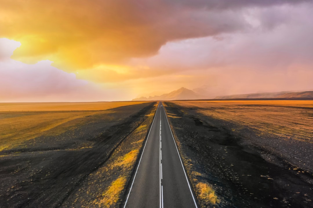 black asphalt road during sunset