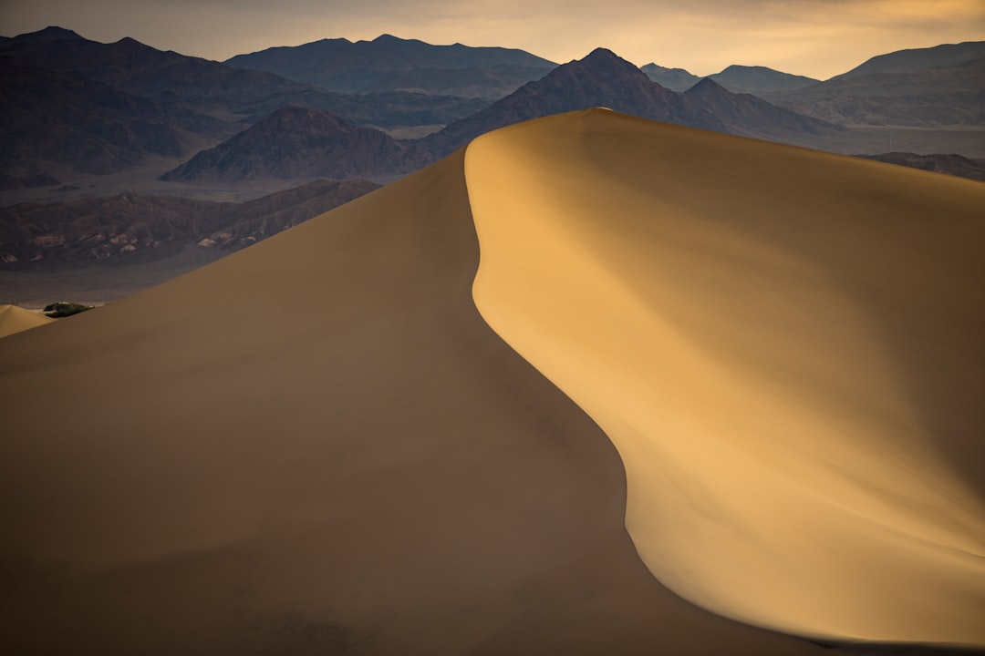 brown sand mountain during daytime