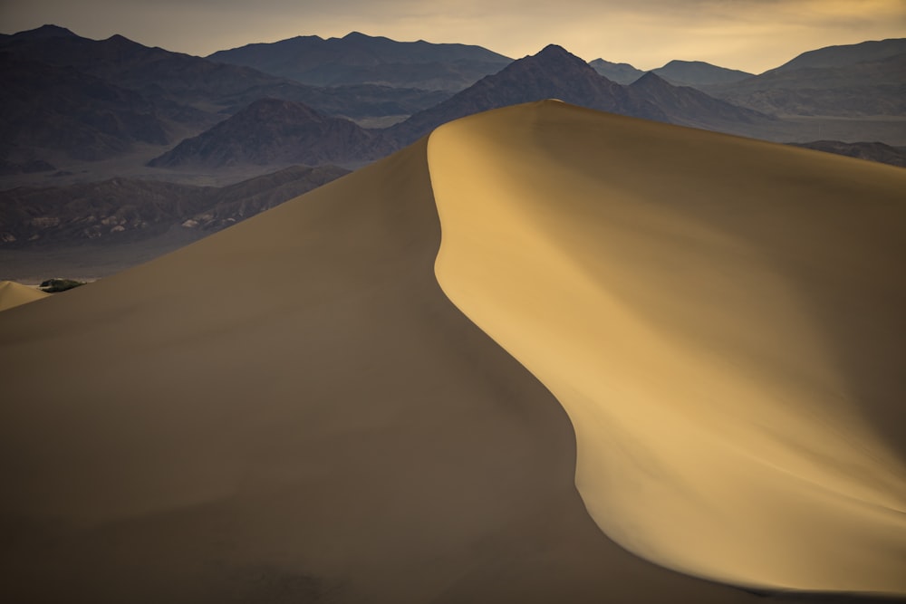 brown sand mountain during daytime