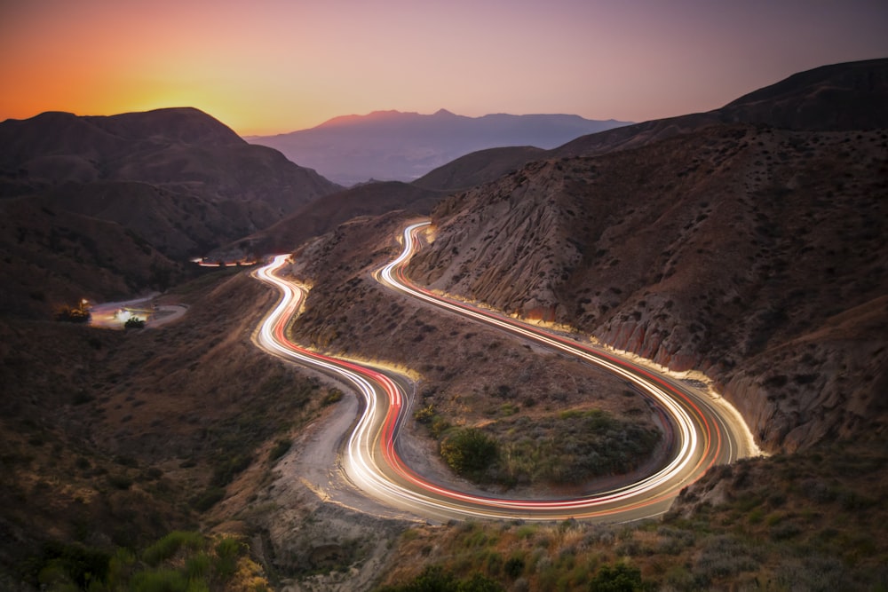 time lapse photography of cars on road during daytime