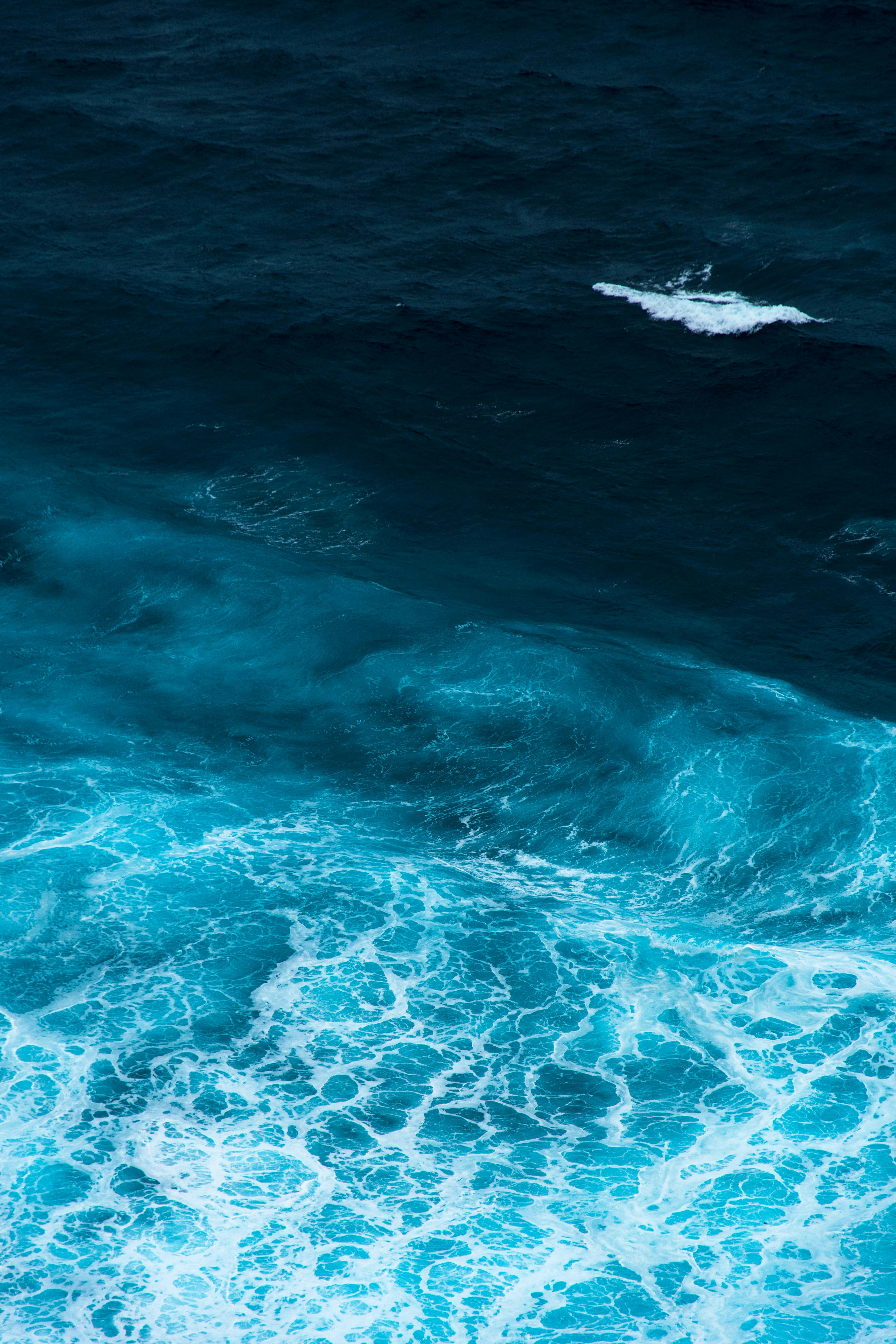 Blue ocean water during daytime photo – Free Uluwatu Image on Unsplash