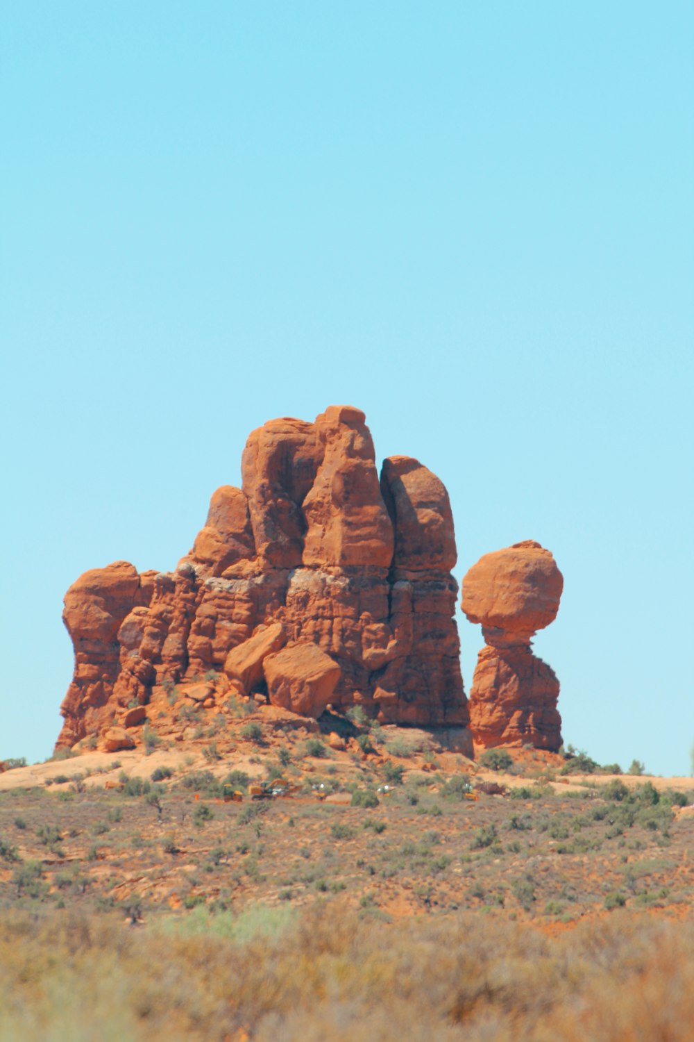 brown rock formation under blue sky during daytime