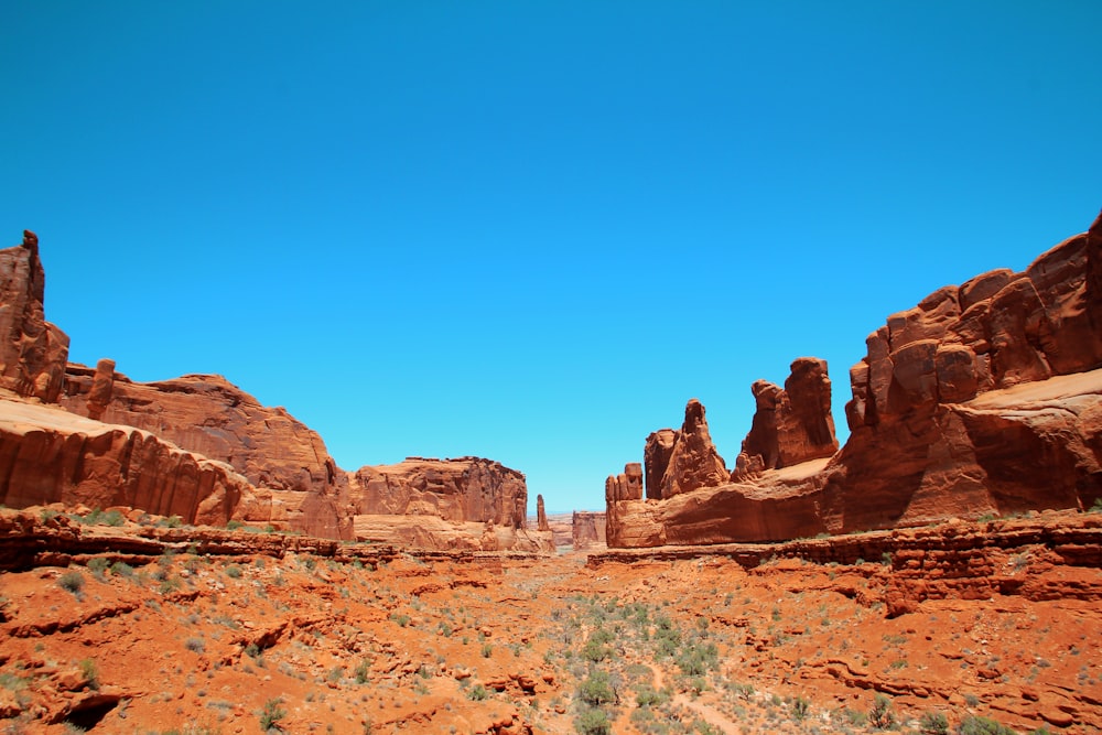 brown rock formation under blue sky during daytime