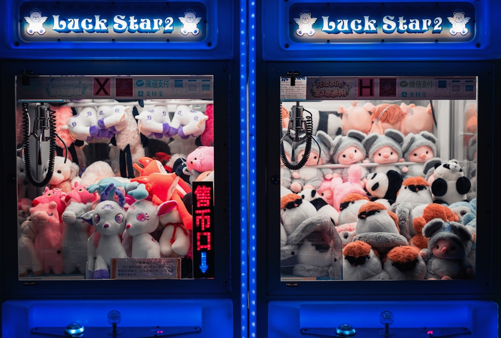 plush toys in blue plastic cabinet