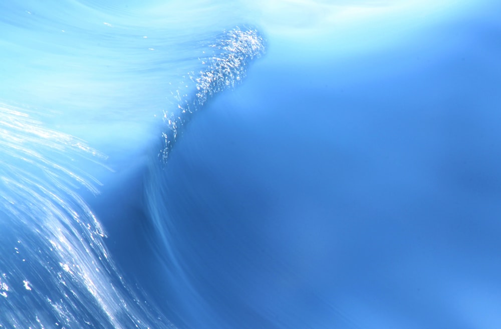blue and white water waves photo – Free Blue Image on Unsplash