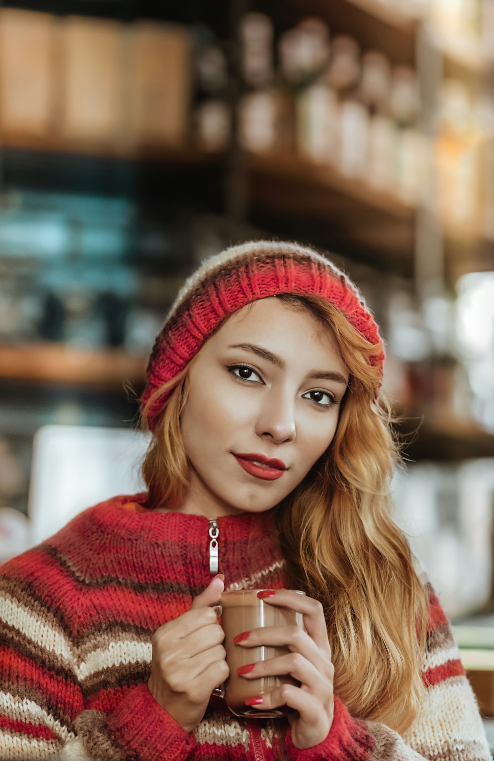 woman in red knit cap and red knit sweater
