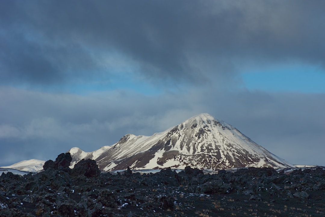 snow covered mountain under blue sky