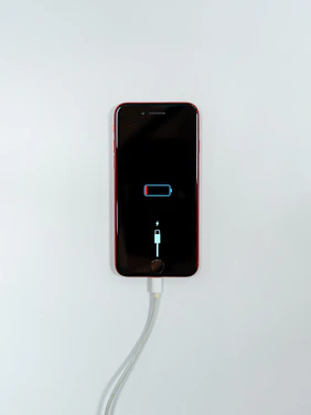 black iphone 5 on white surface