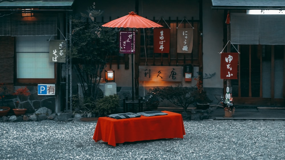 red and black kanji text print table cloth
