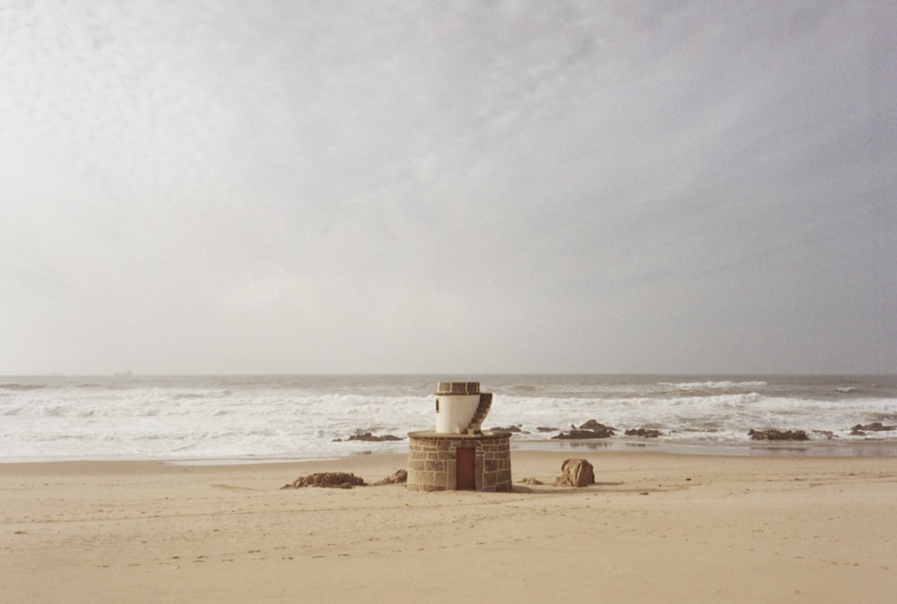 brown sand castle on beach during daytime