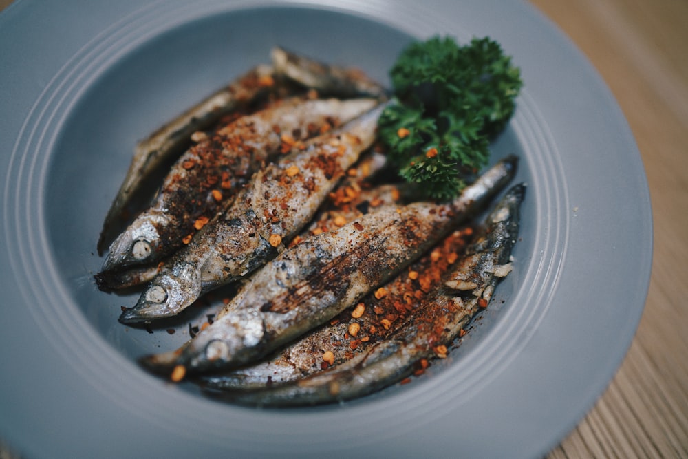 grilled fish on white ceramic plate