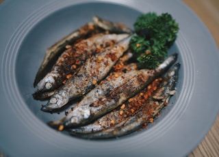 grilled fish on white ceramic plate