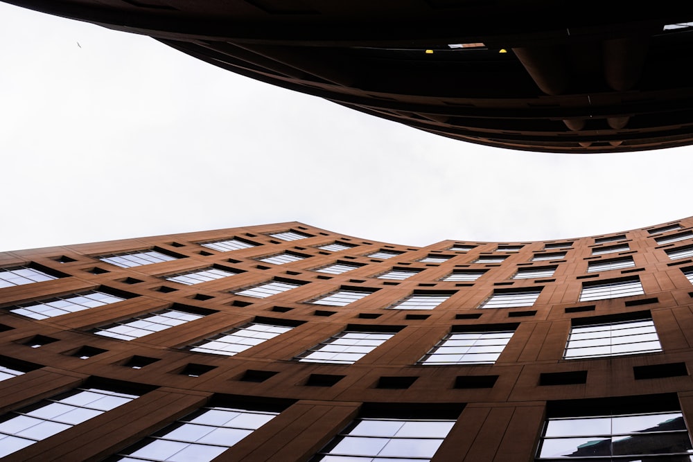 brown concrete building under white sky during daytime