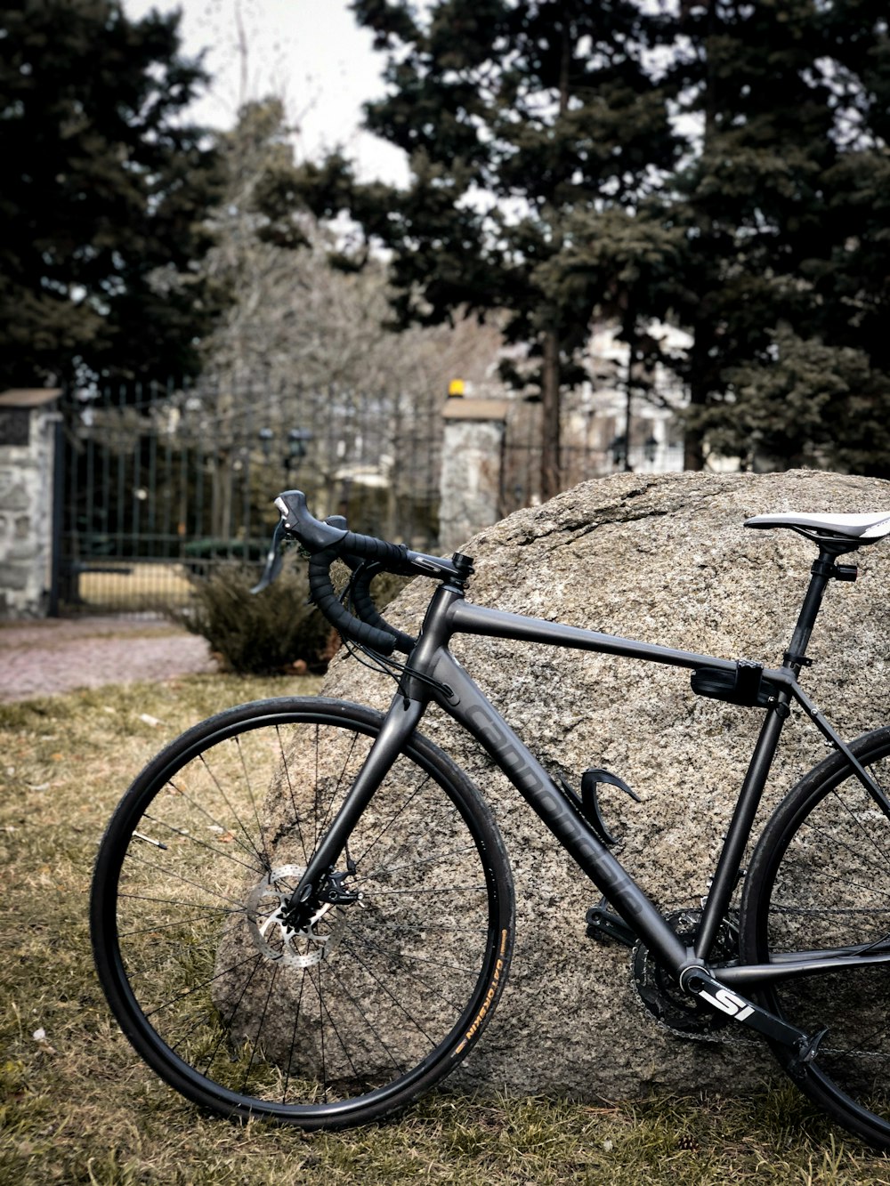 black bicycle on green grass field during daytime