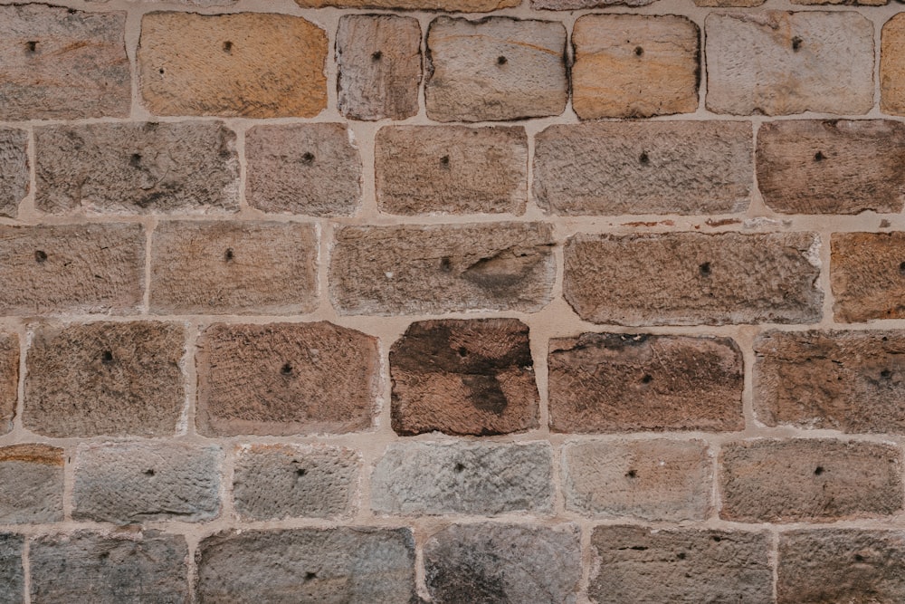 brown and gray brick wall