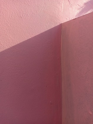 red concrete wall during daytime