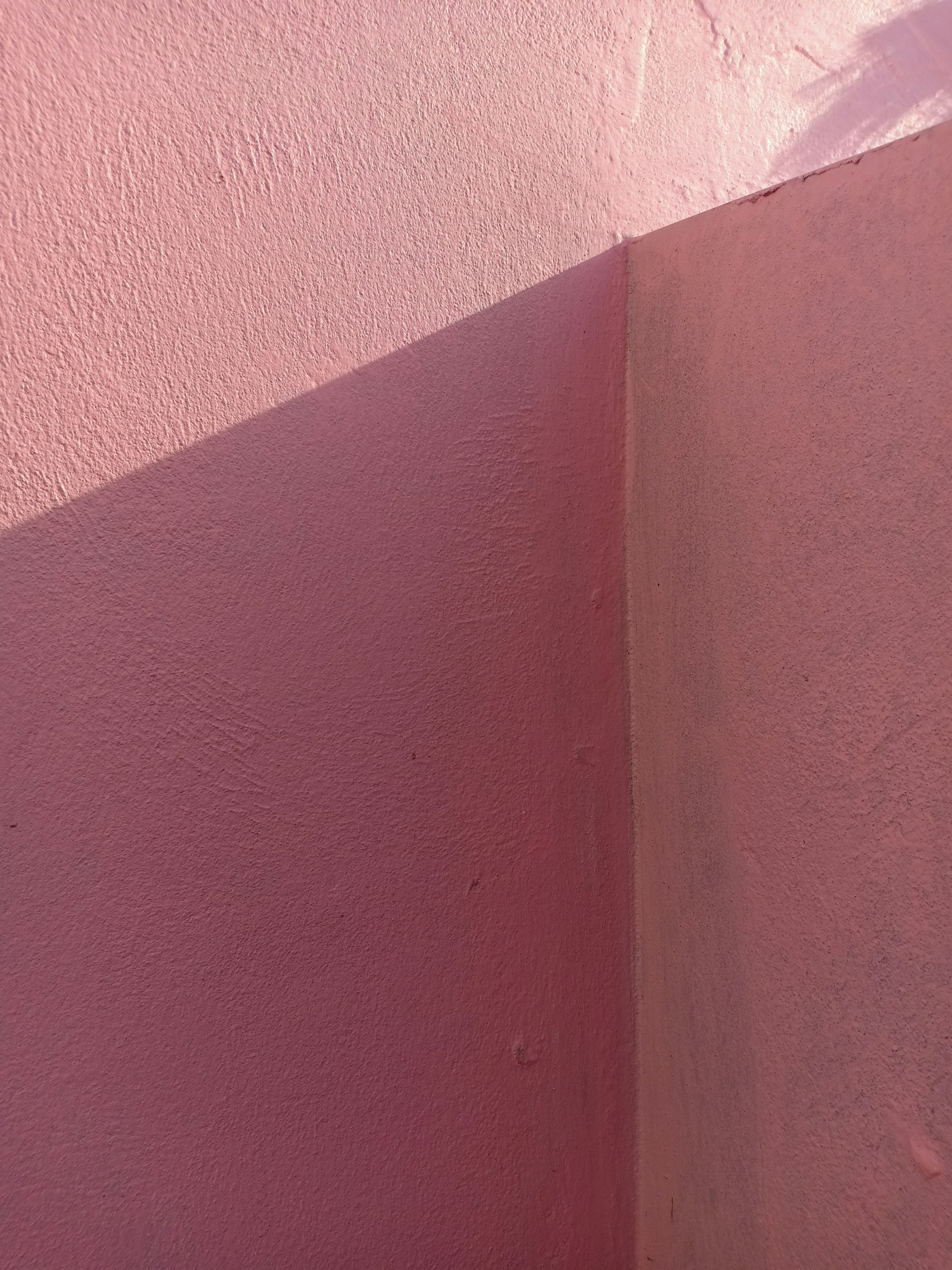 red concrete wall during daytime