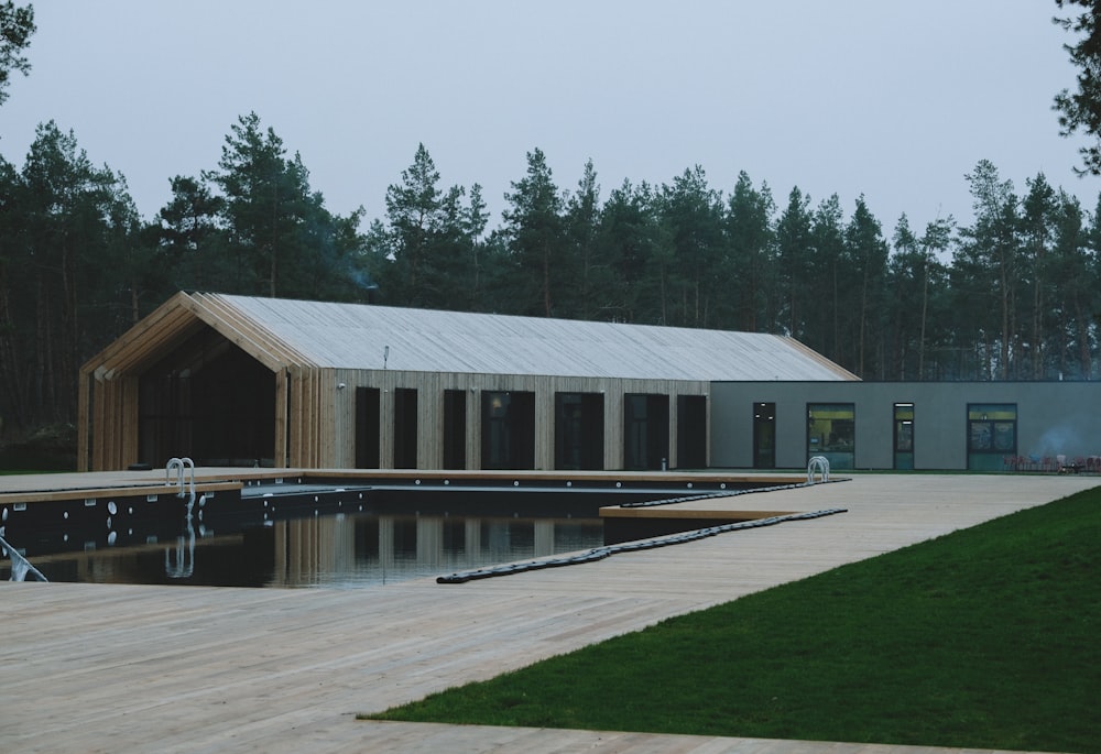 white and green building near body of water during daytime