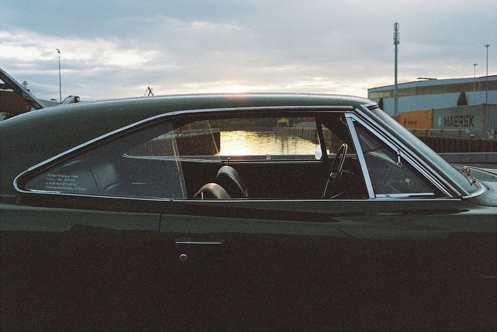 black car with open door