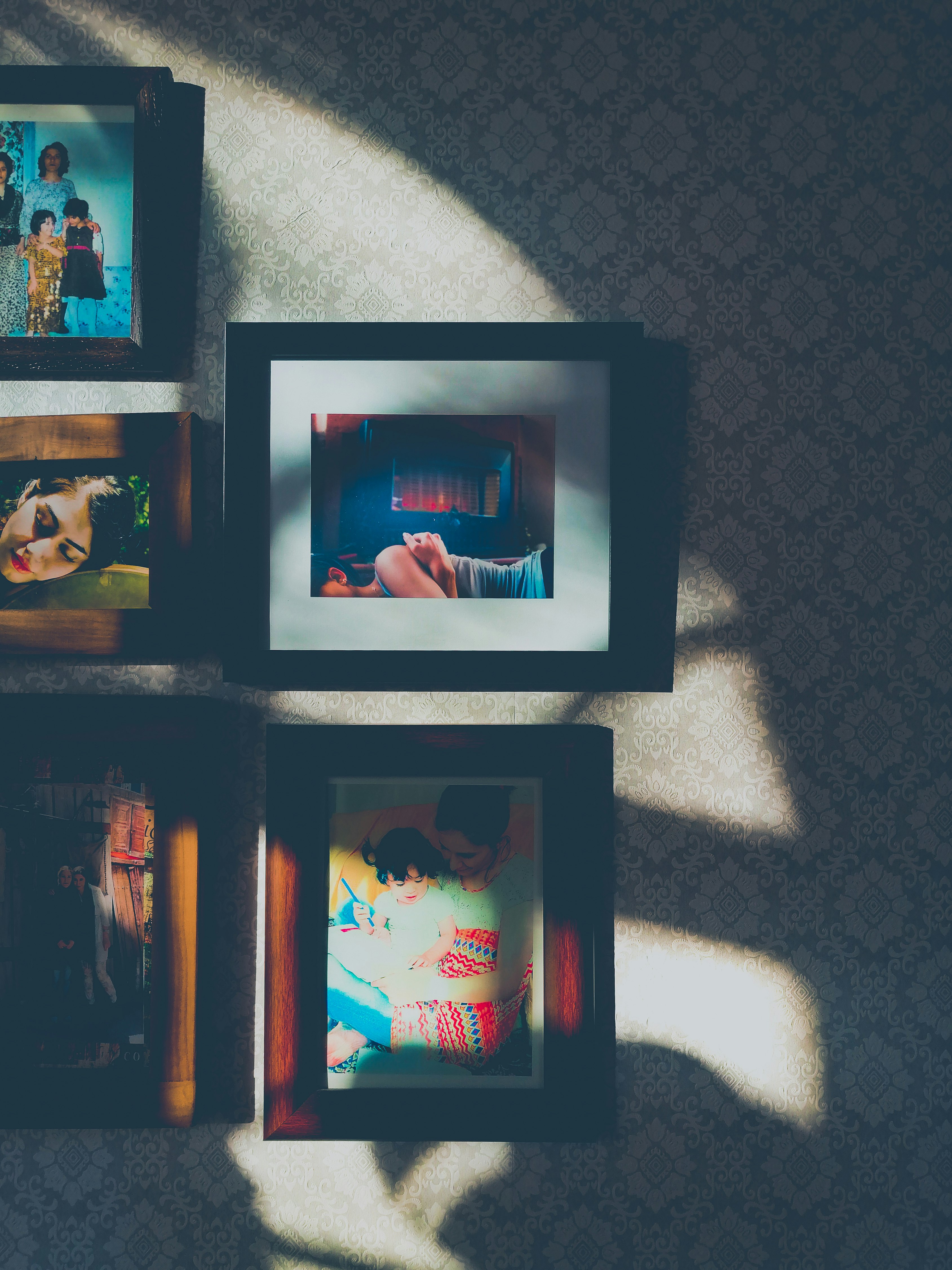 black wooden picture frame on gray textile