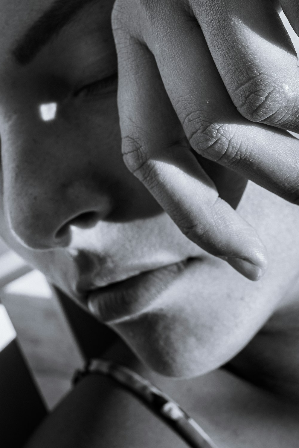 grayscale photo of mans face