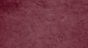 A close-up of a textured abstract print in muted colors.