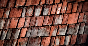 Different roof pitches on a cedar roof highlighting varied aging patterns.