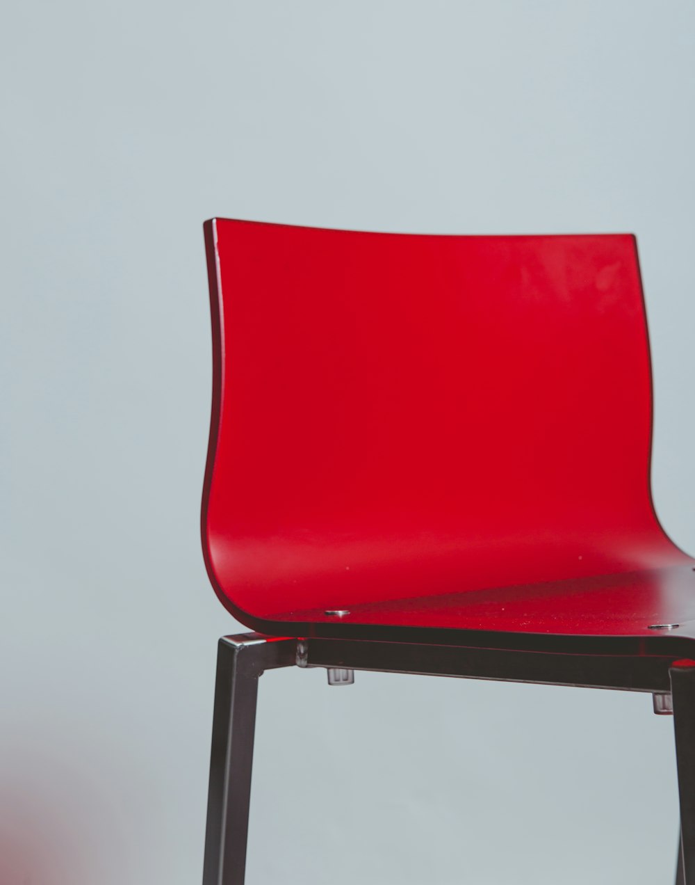 red chair on white floor