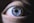 blue and black eye in close up photography