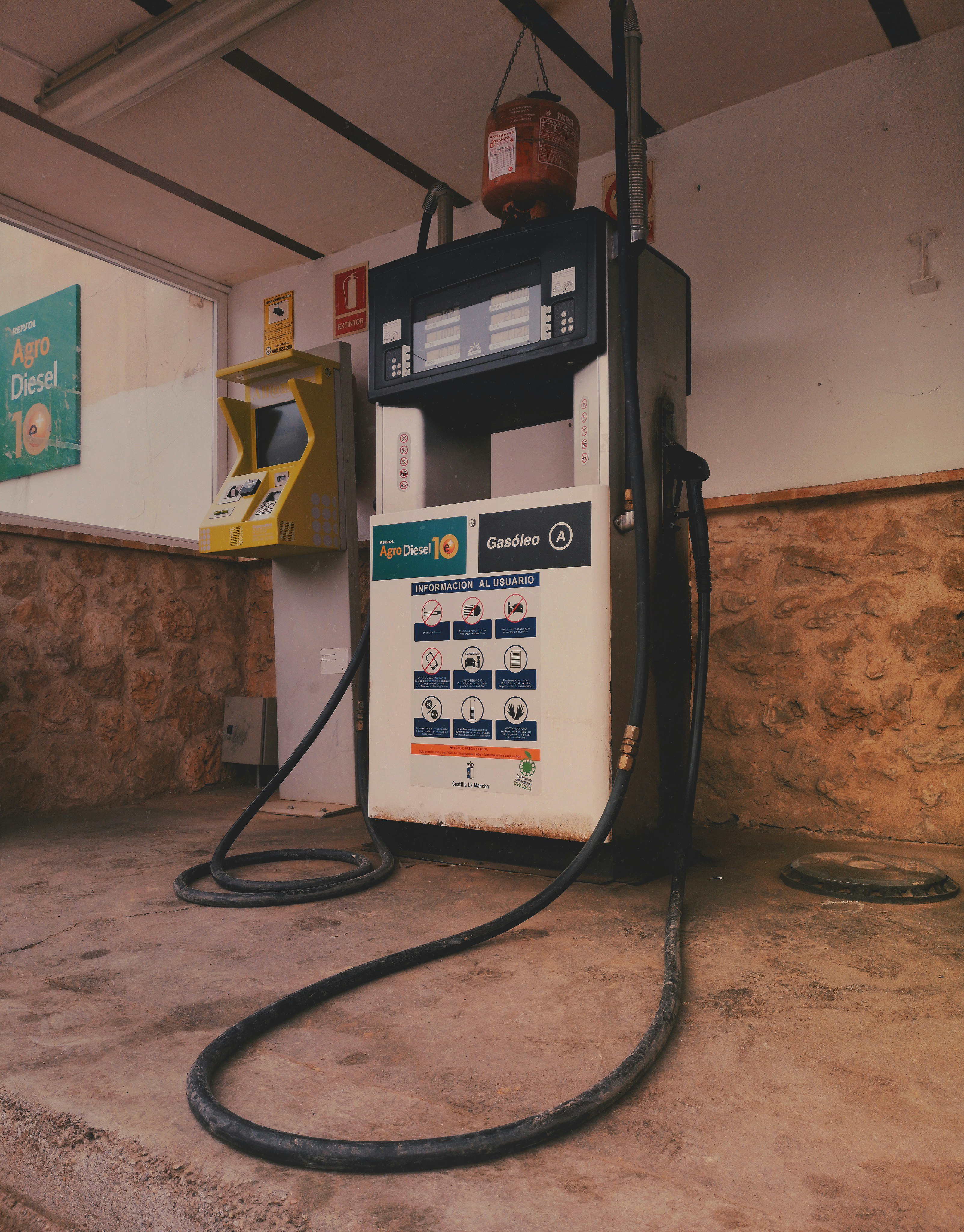 black and yellow gas pump