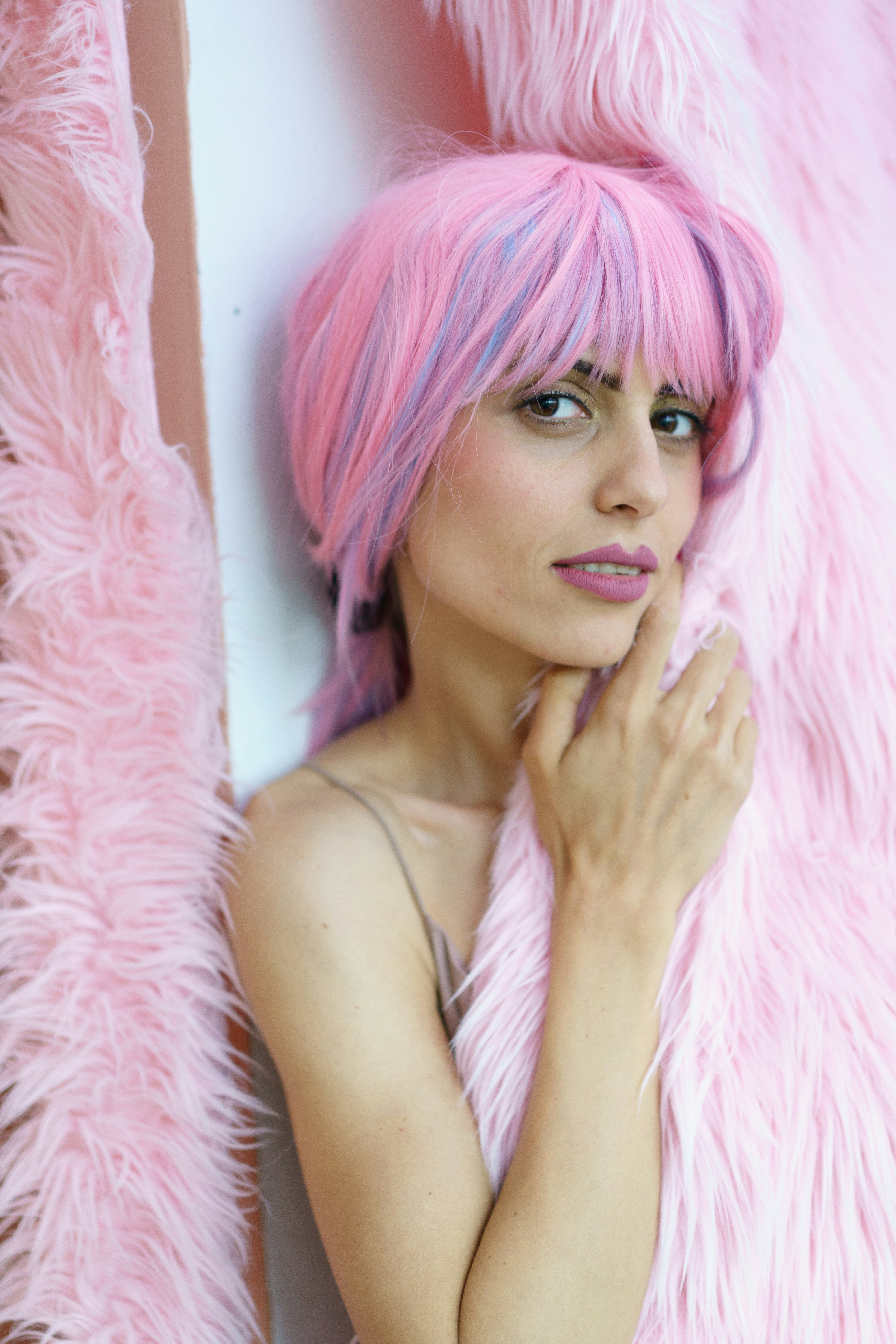 woman in pink hair wearing silver ring