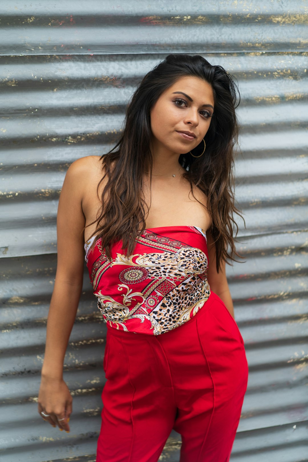 woman in red and white floral tube dress