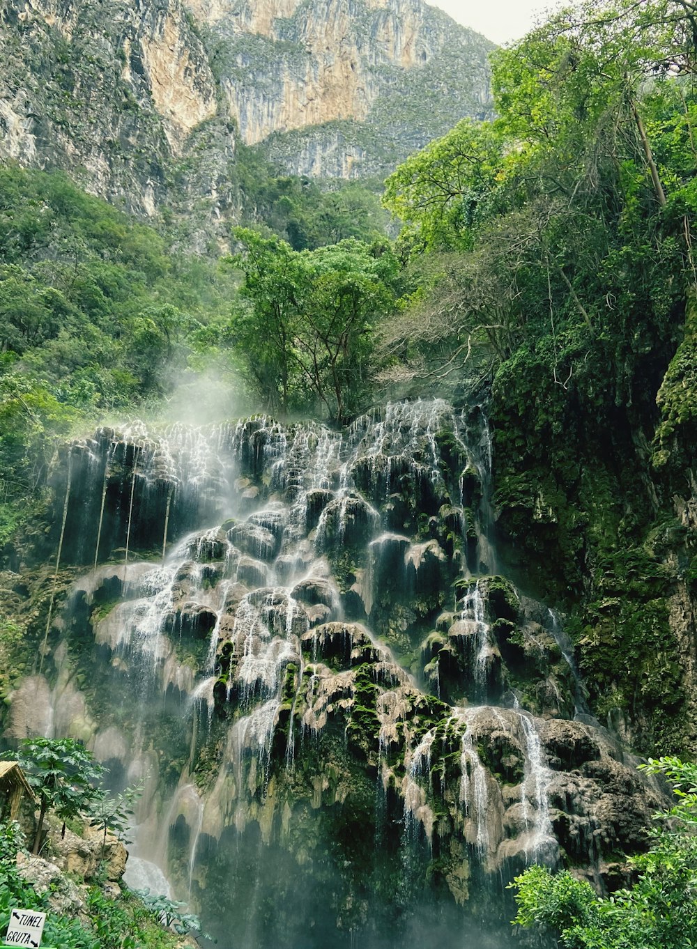 water falls on rocky mountain