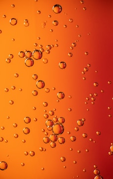 water droplets on orange surface