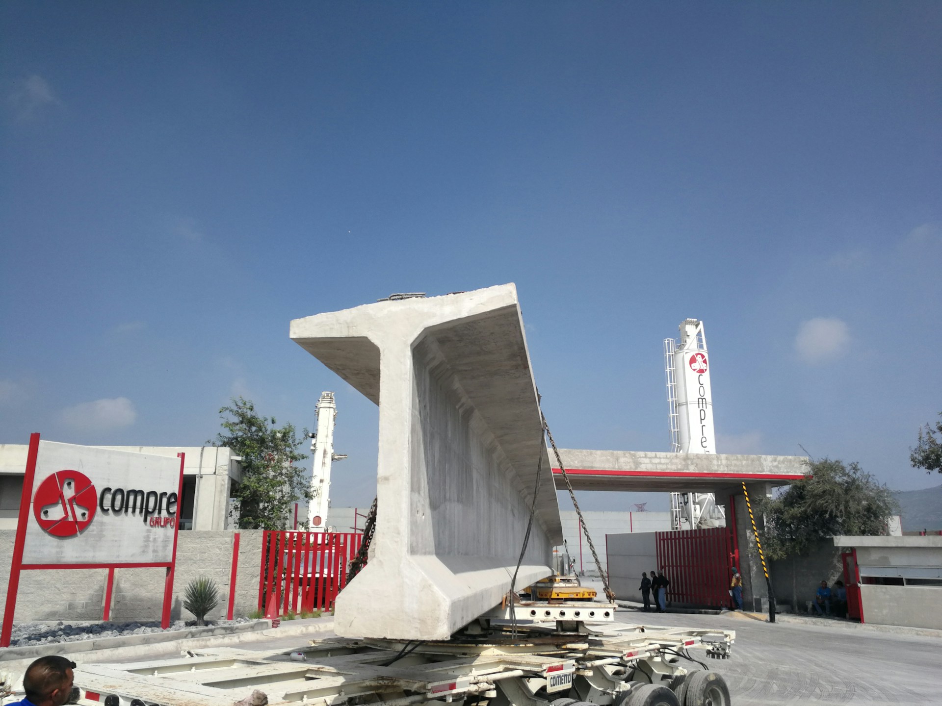 white and red building near white and red building during daytime