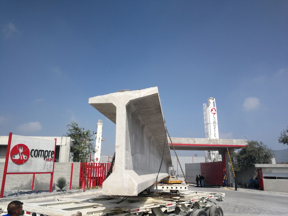 white and red building near white and red building during daytime