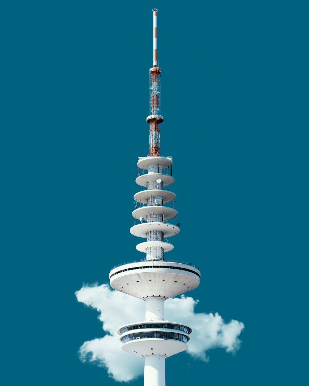 white concrete tower under blue sky during daytime